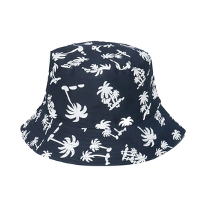 Detail view of white palm tree prints on navy blue cotton canvas bucket hat