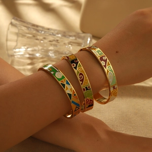 Golden titanium steel bracelets with colorful enamel cloud textures and floral patterns