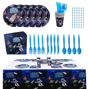 Complete space theme party tableware set featuring astronauts, rockets and blue cutlery