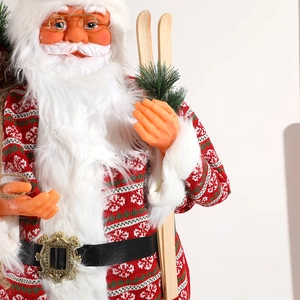 Standing Santa Claus figure in red knit sweater with wooden skis for festive decor