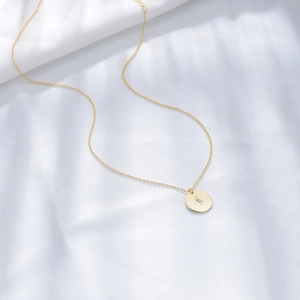 Minimalist S925 sterling silver gold coin necklace featuring a polar star pendant with crystal