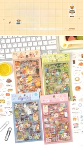 Flat lay of vintage PET stickers with floral and lifestyle themes for DIY scrapbooking