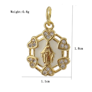 Macro detail of gold-plated Virgin Mary pendant with heart zircon accents 1.8x1.1cm