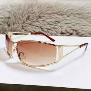 Y2K futuristic oversized champagne gold hollow frame sunglasses for women street style