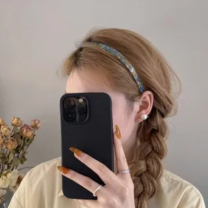 Serre-tête élégant en acétate pour femme avec motif marbré bleu et jaune raffiné
