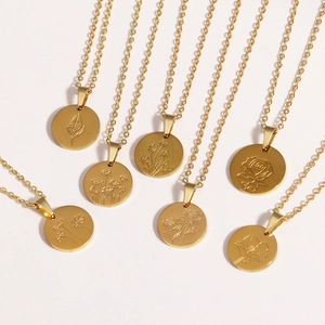 Titanium steel gold oval necklaces featuring engraved monthly birth flower pendants