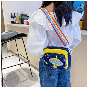 Kid canvas crossbody bag featuring UFO embroidery with rainbow straps on navy and yellow