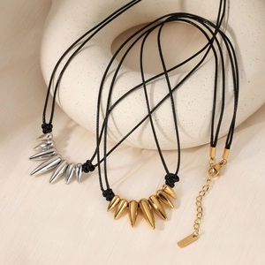 Minimalist spikes pendant necklaces in gold and silver finish with black woven cord straps