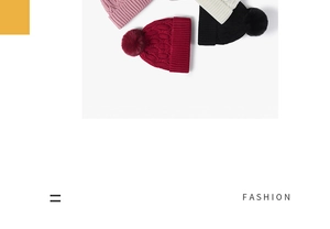 Close-up of thick cable knit texture and faux fur pom-pom on warm winter beanies