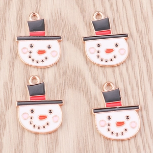 Set of four DIY Christmas snowman charms with gold trim for necklaces and crafts