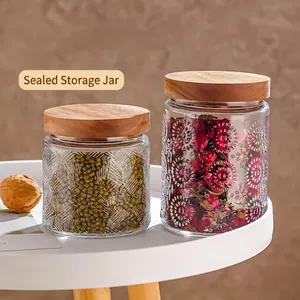 Embossed glass storage jars with bamboo lids for food storage and kitchen organization