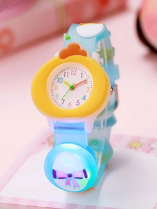 Detail showing cartoon chicken light-up watch for kids with blue silicone strap
