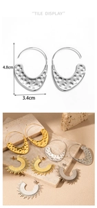 Macro view of geometric hammer texture earrings with dimensions 4.8cm by 3.4cm
