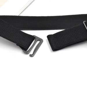 Close-up of adjustable black elastic belt with durable metal hook and adjustment buckle
