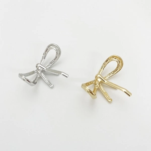 Elegant gold and silver alloy bow-knot hair clips in a minimalist fashion design