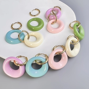 Colorful oval resin earrings with 18K gold plated hoops in various macaron candy colors