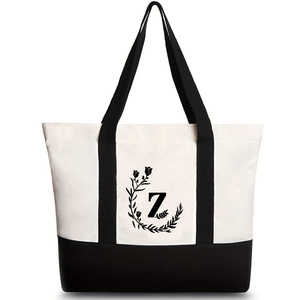 Detail of canvas tote bag featuring floral wreath and number seven print design
