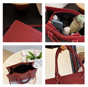 Detail view of red quilted tote bag interior space and textured PU leather surface