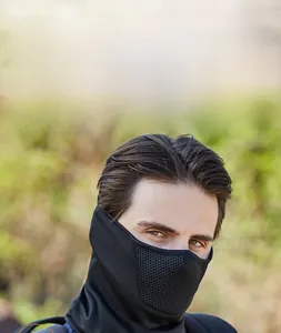 Detail of black cycling face mask showing breathable mesh area for mouth and nose comfort