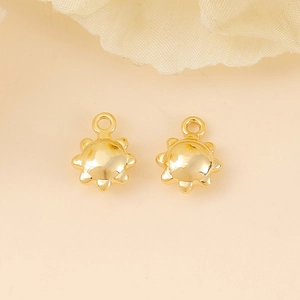 Pair of golden sun charms with polished metal finish for DIY jewelry making accessories