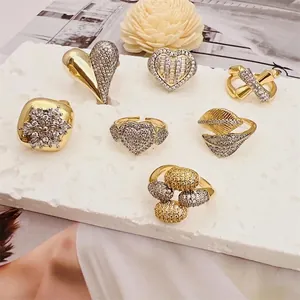 Set of 18K gold-plated adjustable rings with heart, leaf, and snowflake zircon designs