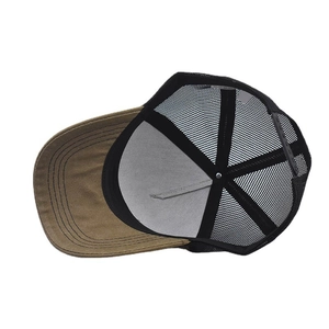 Detailed interior view of trucker hat showing mesh back and adjustable snapback closure