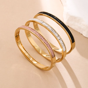 Gold plated stainless steel hinged bracelets set with rectangular crystal stones