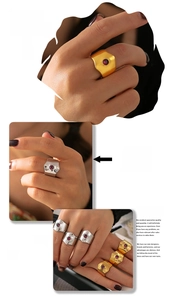 Detail of adjustable geometric stainless steel ring with inlaid purple zircon stone