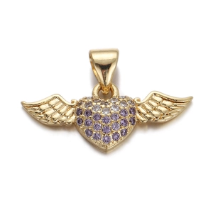 Detailed close-up of a gold winged heart pendant with purple and white crystal pave stones