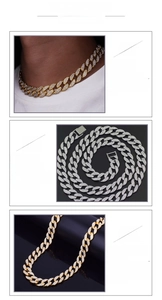 Detail of hip hop Cuban link chain with gold and silver plating and sparkling crystals