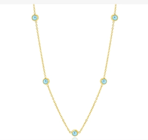 Detail of 18K gold-plated necklace featuring five light blue evil eye beads on a chain