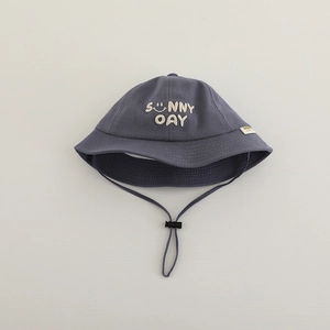 Detail of grey cotton baby sun hat with Sunny Day embroidery and adjustable wind rope