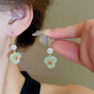 Elegant Chinese style resin flower drop earrings with jade-like texture and gold hooks