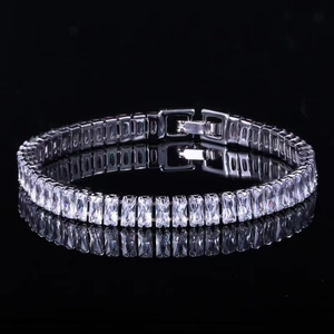 Macro shot of silver baguette-cut cubic zirconia tennis bracelet with secure clasp