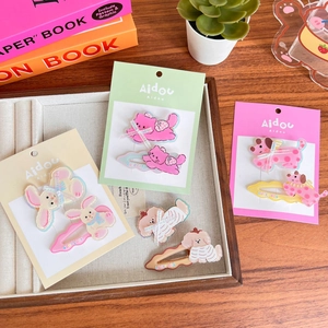 Cute acrylic animal hair clips featuring bunny, cat and puppy designs on display card