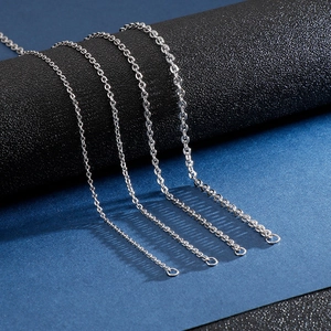 Detail view of silver stainless steel O-chain link necklaces in four different thicknesses