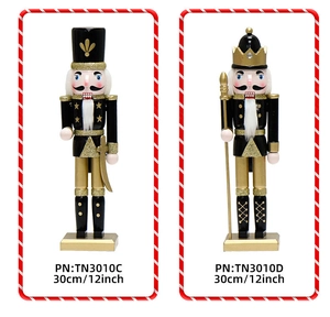 Detailed view of 30cm black and gold wooden nutcracker soldier and king figurines