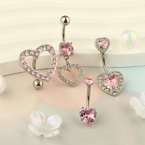 Pink heart crystal navel rings set in polished surgical steel for belly piercing