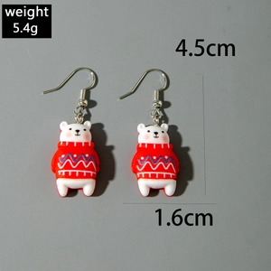 Boucles ours polaire avec pull rouge, dimensions 4,5cm et poids 5,4g