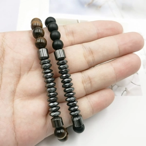 Two-piece set of 6mm tiger eye and matte onyx beaded bracelets with hematite accents