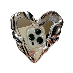 Silver heart-shaped mirror phone grip with liquid metal texture and foldable stand