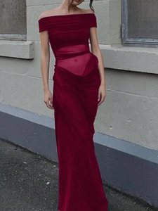 Detail of burgundy off-shoulder evening gown with sheer mesh waist paneling and floor length