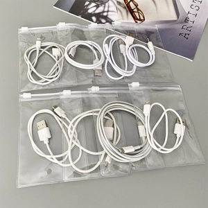 Portable PVC transparent storage pouches for sorting multiple white USB cables and chargers