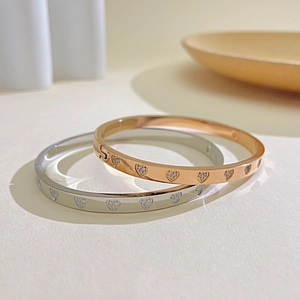 Elegant rose gold and silver heart-shaped diamond stainless steel bangles set