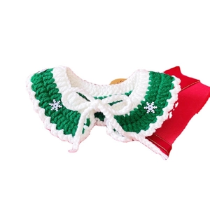 Handmade crochet Christmas pet collar with green festive pattern and white snowflake bell