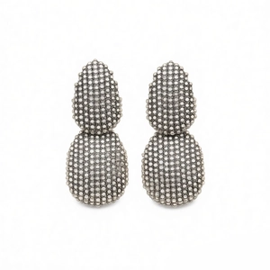 Vintage silver teardrop earrings with textured bead surface and steel needles