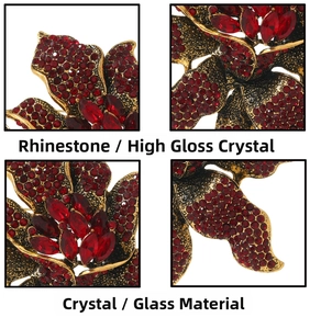 Macro details of vintage floral brooch with red rhinestones and crystal accents