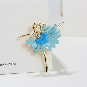Close-up of ballet dancer brooch with blue enamel dress and sparkling crystals