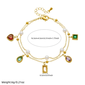 Detail showing gold layered bracelet with pearls and colorful zircon charms and dimensions