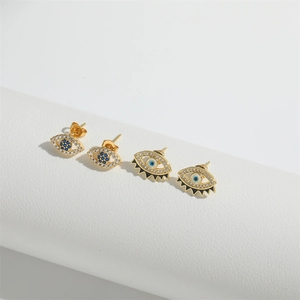 Gold plated evil eye stud earrings set with sparkling micro-pave white cubic zirconia